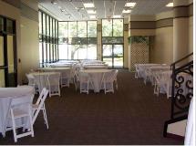 Setup at Welder Center with Round Tables and White Resin Chairs